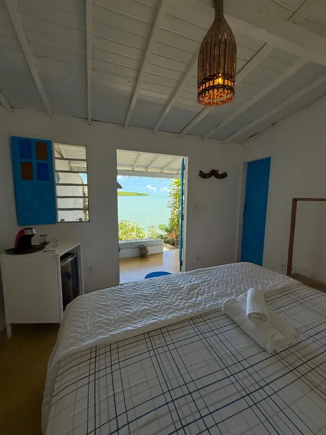 Quarto com vista para o rio